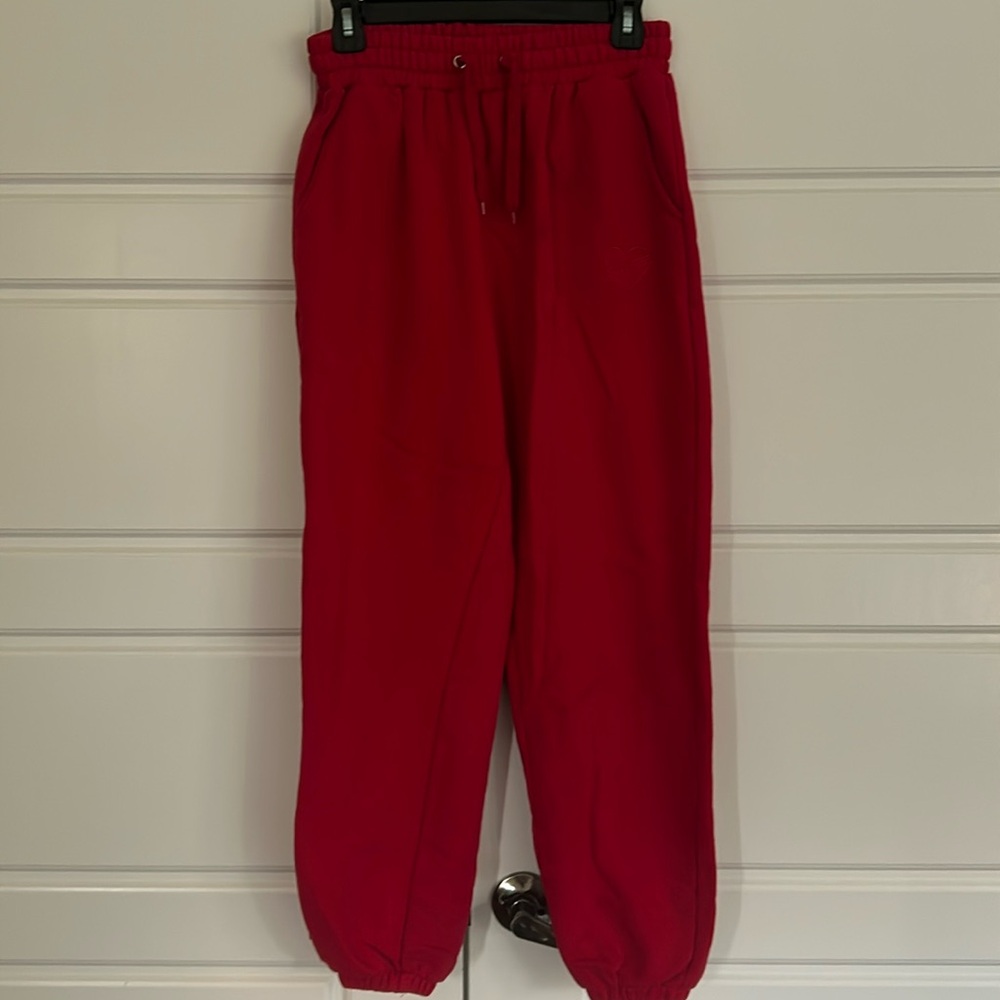 Red women’s BO+TEE sweatpants